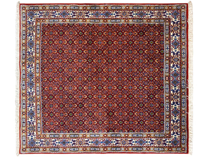 Oriental rug 132x122 cm, red coffered pattern with blue border