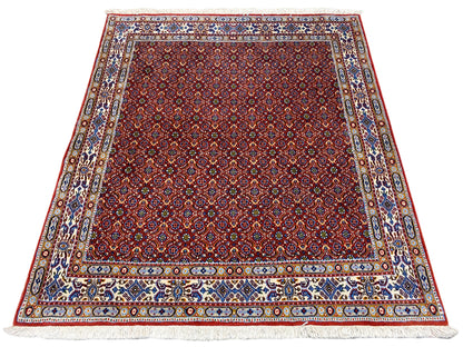 Oriental rug 132x122 cm, red patterned rug with a colorful border pattern