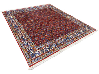 Oriental rug 132x122 cm, red all-over pattern with border and frayed edges