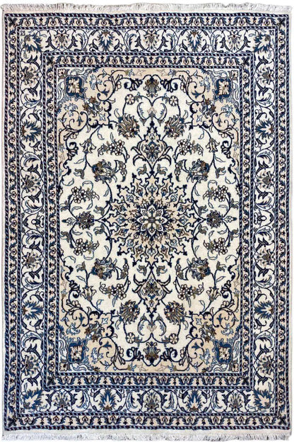 Nain rug with blue and white ornaments and a floral medallion, rectangular, bordered.