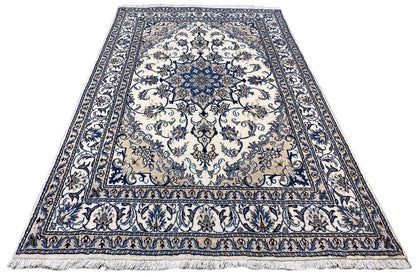 Nain rug, rectangular, blue-and-white ornamental pattern with decorative border and fringed edge