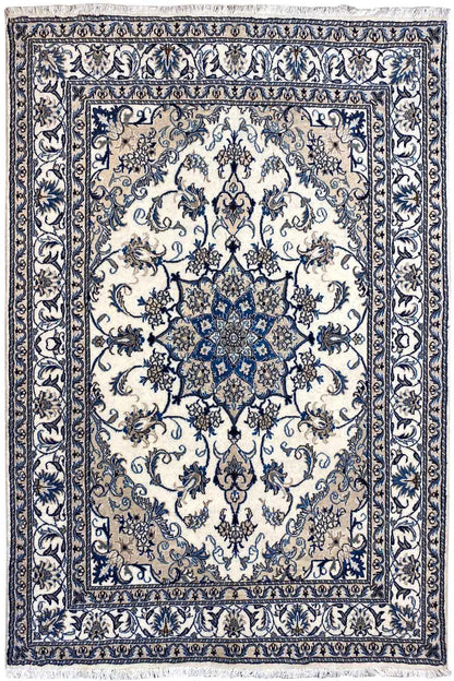 Nain rug with a blue-and-white medallion pattern and a wide decorative border, rectangular
