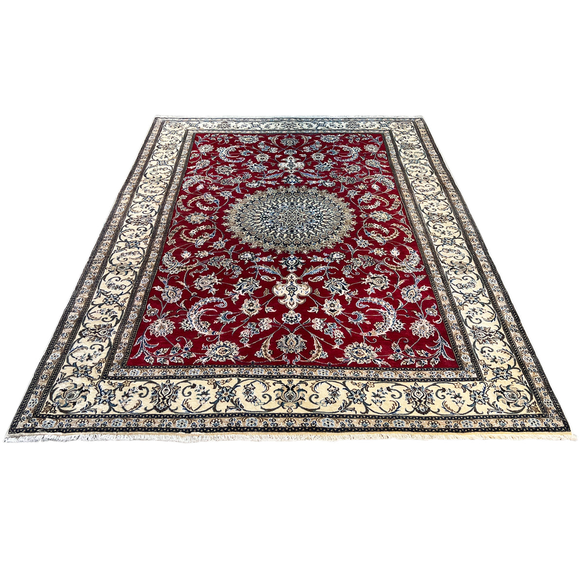 Rectangular Nain wool rug with a red central medallion and a wide ornamental border frame