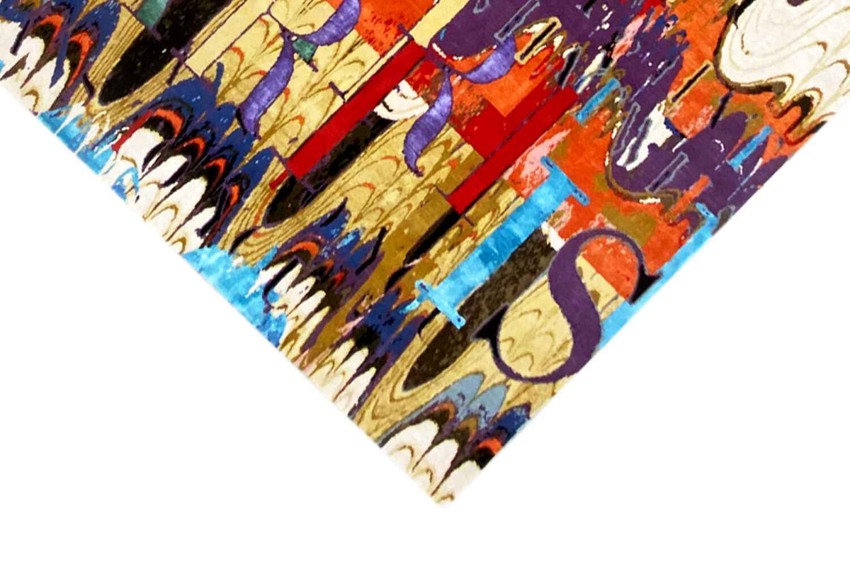 Corner detail: multicolored designer rug with abstract lettering and line motifs