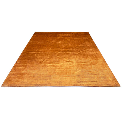 Carpet surface in warm orange-brown with a uniform relief finish.