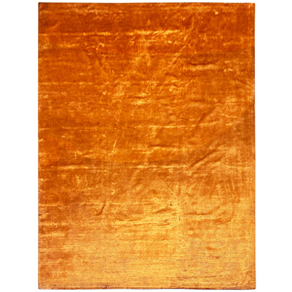 Rug in vivid orange with a delicate, glossy-looking raised texture.
