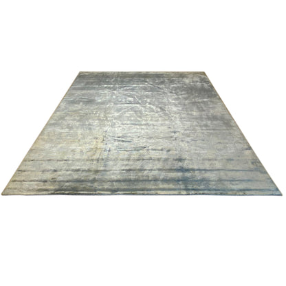 Carpet surface with a greenish-gray vintage pattern and a fine, matte texture