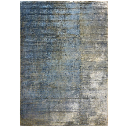 Rectangular rug in blue-gray with a mottled vintage look and fine texture