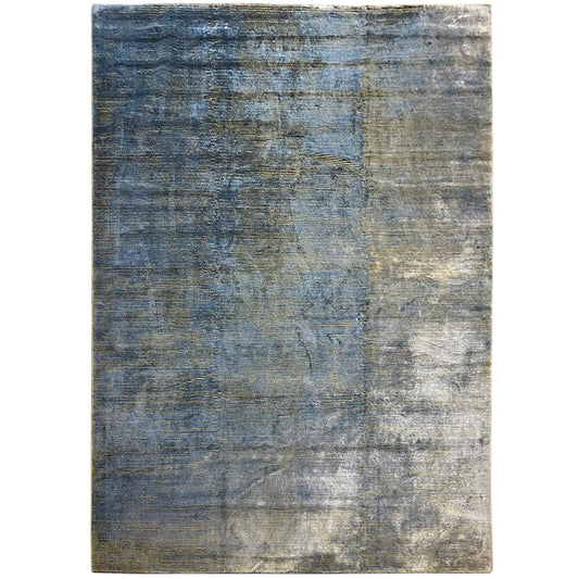 Rectangular rug in blue-gray with a mottled vintage look and fine texture