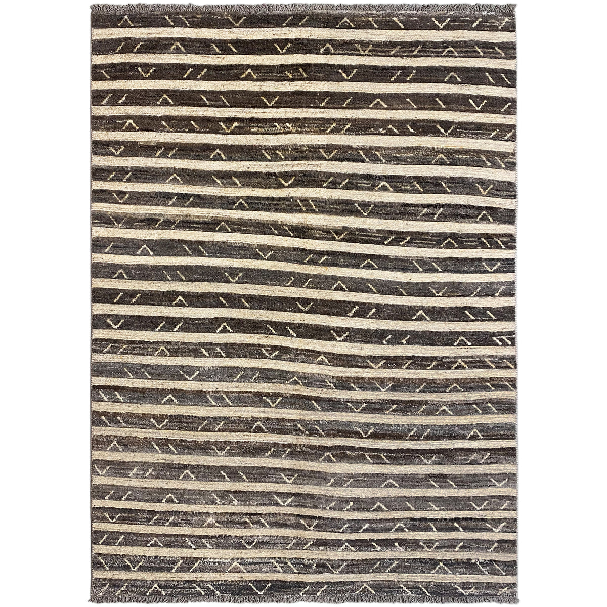 Rectangular rug with a brown-black striped pattern and triangles, with fringes