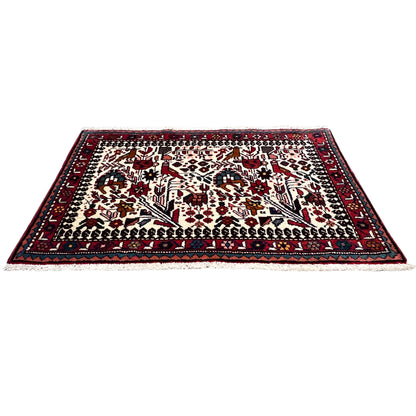 Poshti rug, lying flat, colorful ornamental pattern with a dark red border