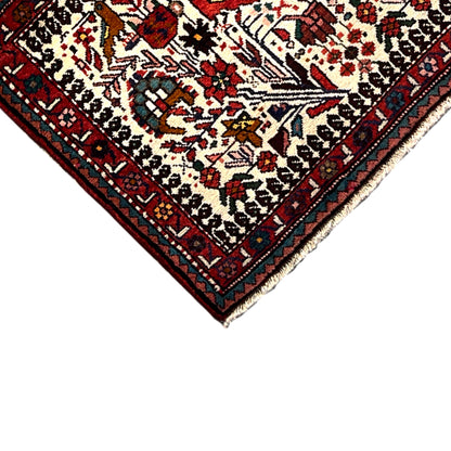 Poshti rug corner detail with multicolored edging and woven pattern