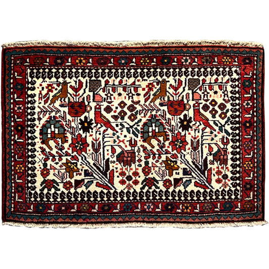 Poshti rug with a colorful oriental pattern and a wide border, rectangular