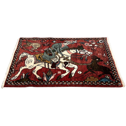Red Hamedan rug with a figurative design, decorative borders, and outlined corner points