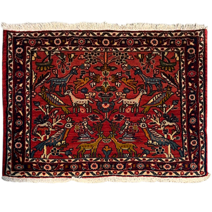 Red Poshti rug with multicolored ornamental pattern and border, 77x51 cm