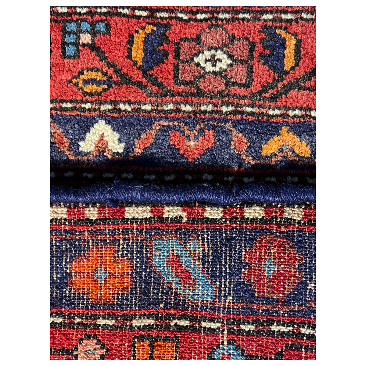 Close-up of trim with colorful ornaments and a blue border, including fringes