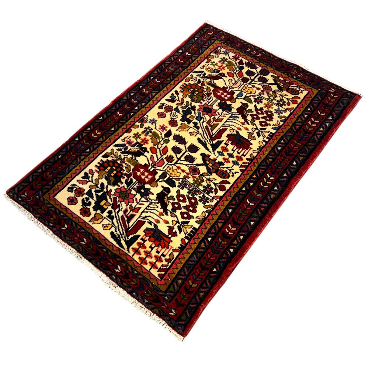 Colorful Poshti rug at an oblique angle: traditional ornamental pattern in cream, red, and blue