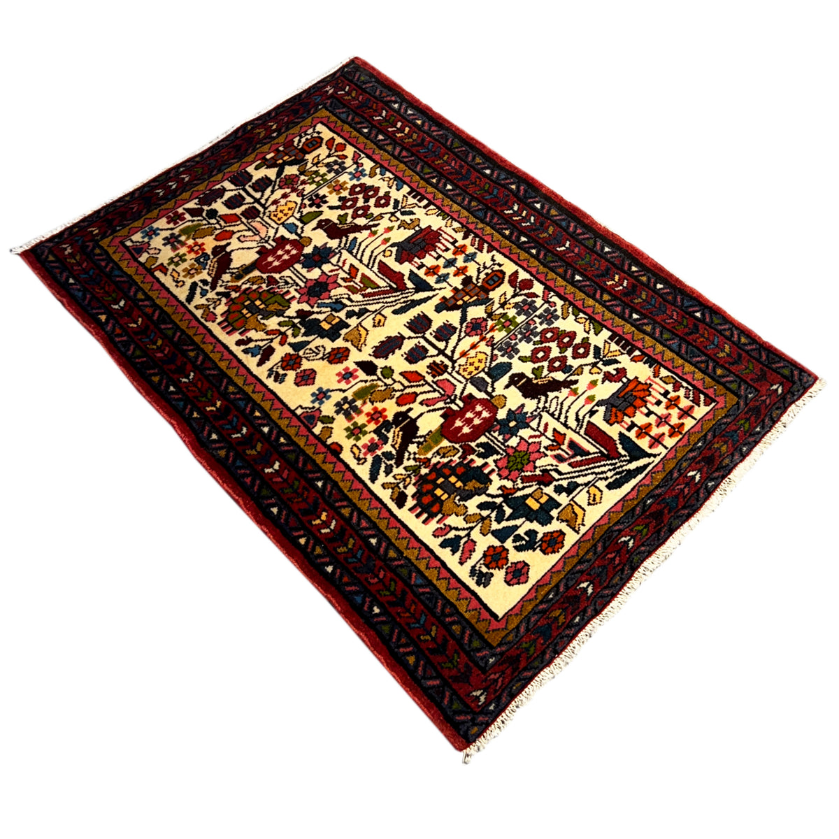 Colorful Poshti rug aligned in the room: intricate pattern in cream, red, and blue