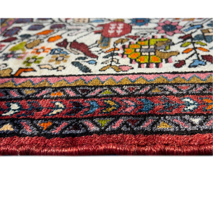 Rug border with a pattern and red pile finishing edge, border in blue and red