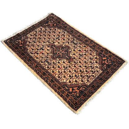 Beige Poshti rug with a symmetrical ornamental pattern and a wide dark border