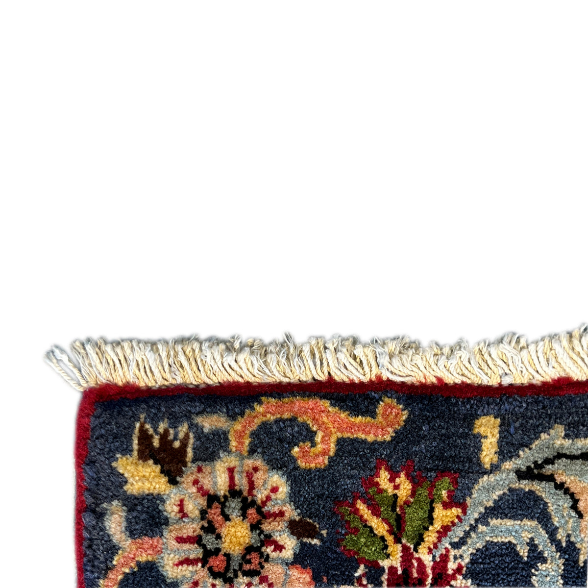 Carpet fringes and border patterns in red, dark blue, and beige