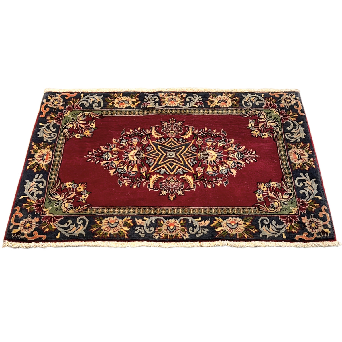 Rug with a red center, a dark ornamental border, and a delicate border stripe