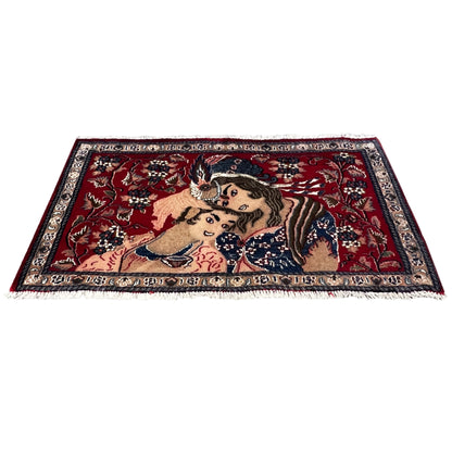 Red patterned rug with a decorative central motif and ornamental border
