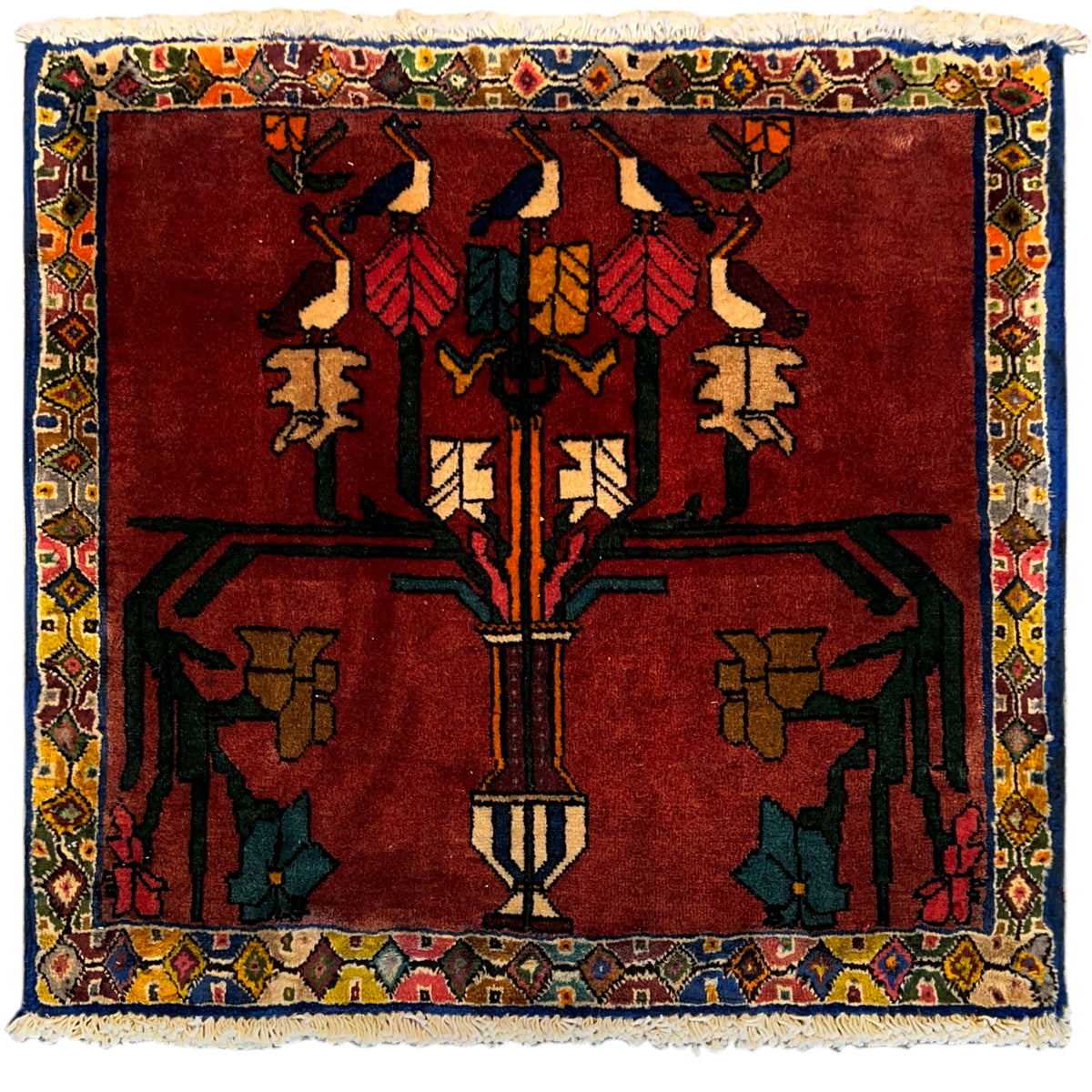 Rug with a red background and multicolored Oriental pattern, rectangular, fringed