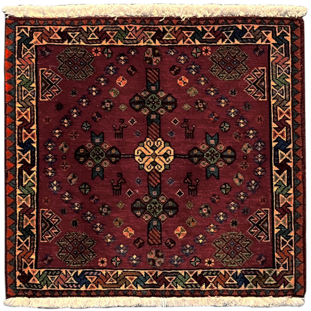 Red Poshti rug with ornaments, multicolored border and fringes, 55x56 cm