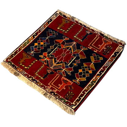 Poshti rug, diagonal view: red and dark blue with star-shaped ornaments, 51x50 cm