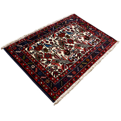 Rug in diamond view with a geometric pattern, cream base, blue border stripes
