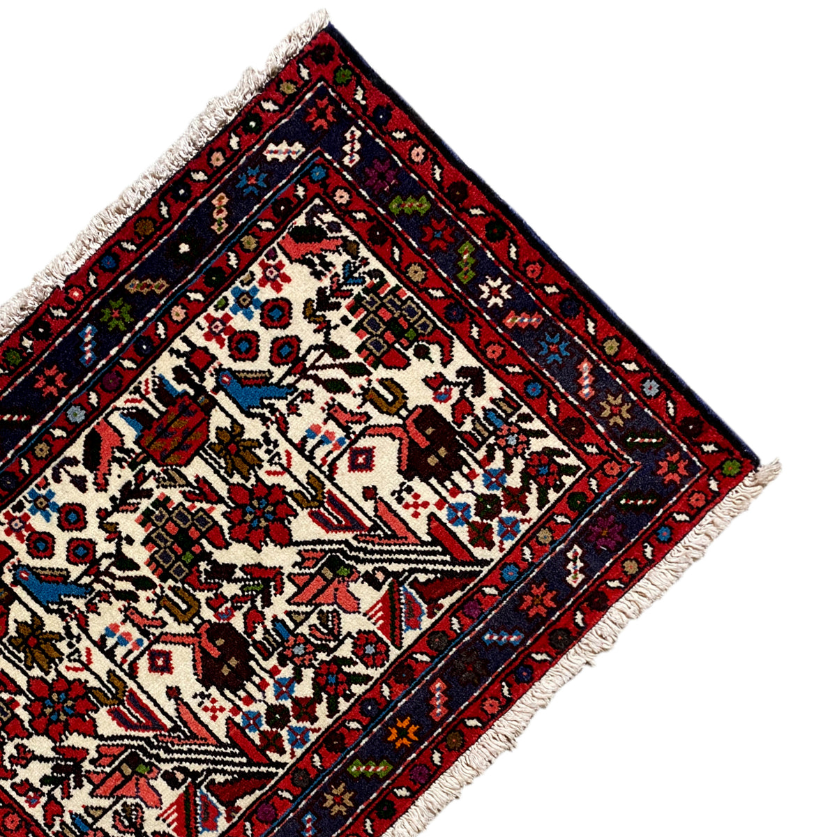 Carpet corner with vines and shapes, cream background, dark blue border