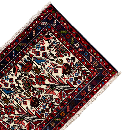 Carpet corner with vines and shapes, cream background, dark blue border