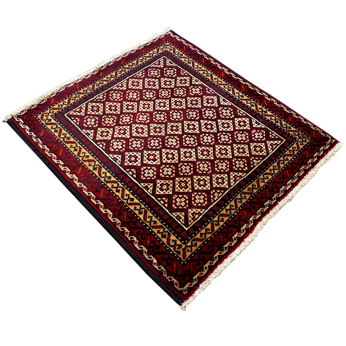 Rug 65x61 cm, red diamond pattern in the inner field, multicolored border, fringe