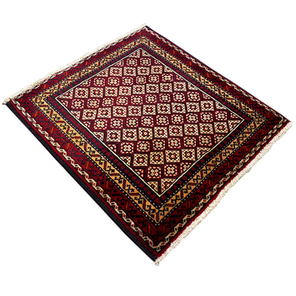 Rug 65x61 cm, red diamond pattern in the inner field, multicolored border, fringe