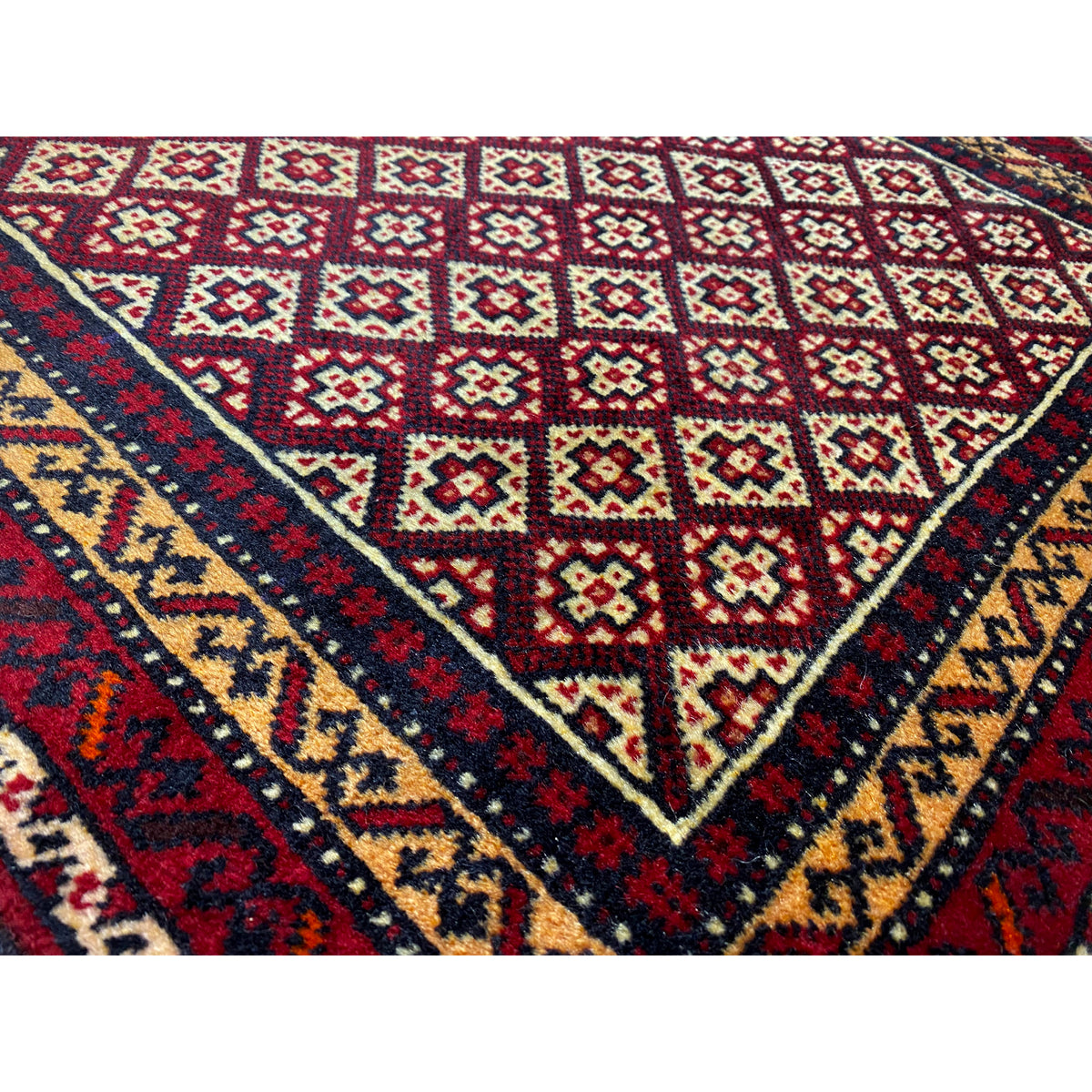 Carpet 65x61 cm close-up: red, cream, and yellow tiles in diagonal rows