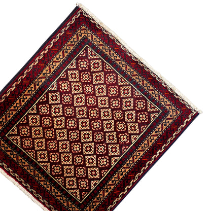 Rug 65x61 cm, angled, red diamond pattern with dark blue edging and a cream border