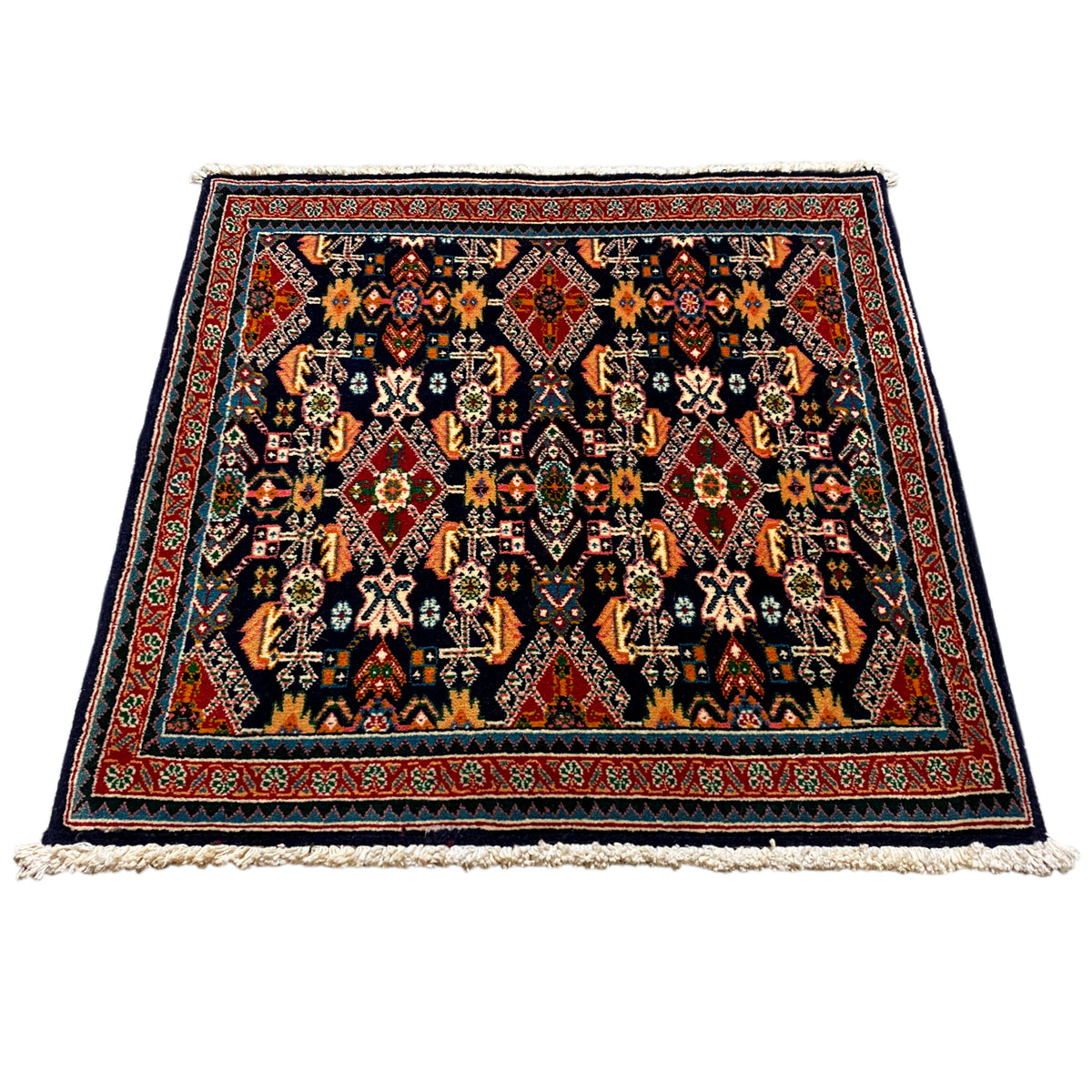 Rug 61x60 cm, flat-woven, dark background with a colorful pattern and a wide border.
