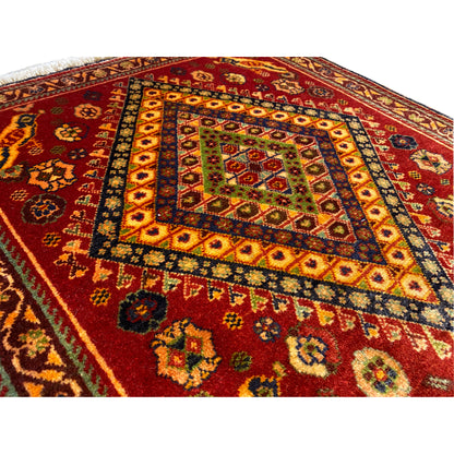Detail view of Poshti rug, 65x65 cm: fine embroidery in a red ornamental pattern