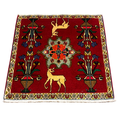 Poshti rug (67x64 cm) with a red ornamental pattern, central medallion design, and border.