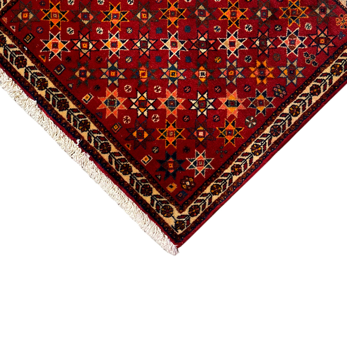 Poshti rug 59x56 cm, corner detail with red geometric pattern and fringe