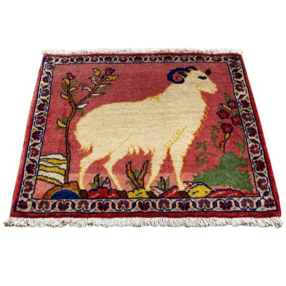 Rug 54x48 cm with fringes, red pattern with animal and floral border