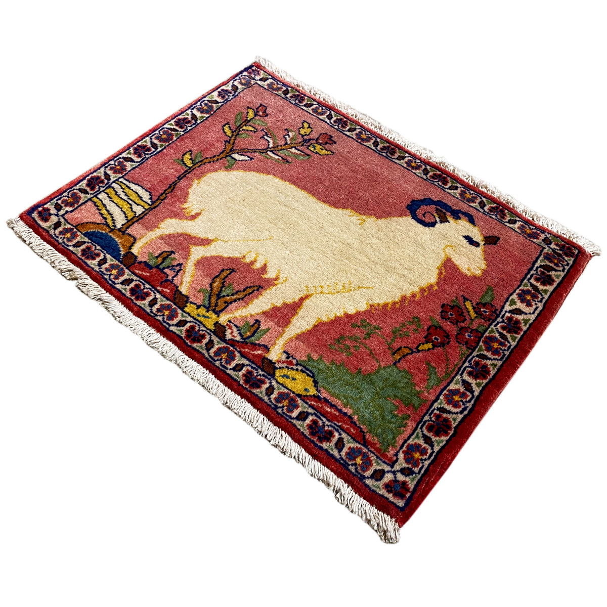 Rug 54x48 cm with fringe, red area with an animal motif and plant ornaments