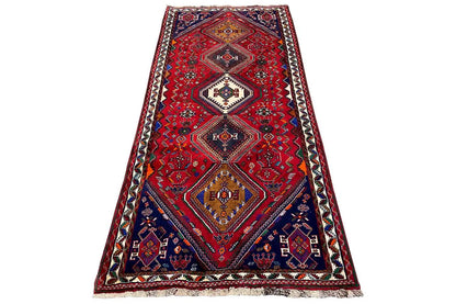 Qashqai runner with a red geometric pattern and border, approx. 259×116 cm