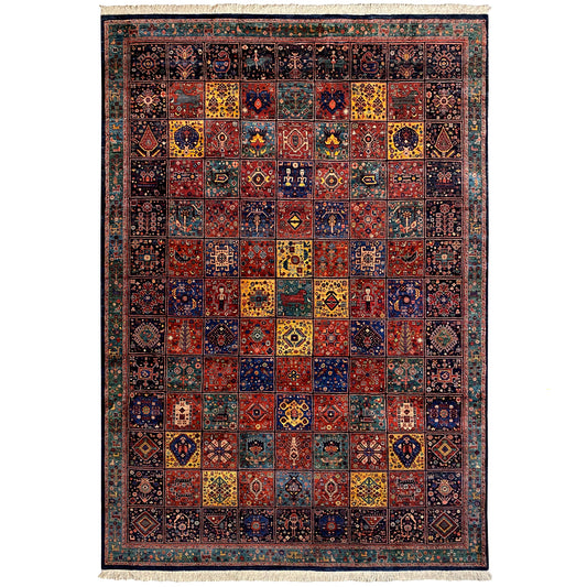 Qashqai rug with colorful patchwork ornament, dark background, and bordered edge