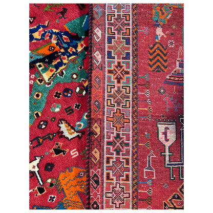 Qashqai rug border detail: red field with ornamental border and small figures