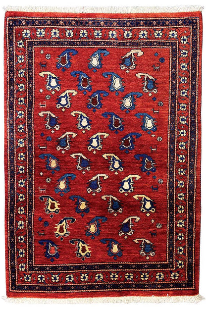 Qashqai rug 126×81 cm with red field, blue all-over ornament and fringes