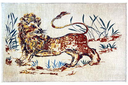 Rectangular rug with a reclining lion in red, brown and blue on a light background
