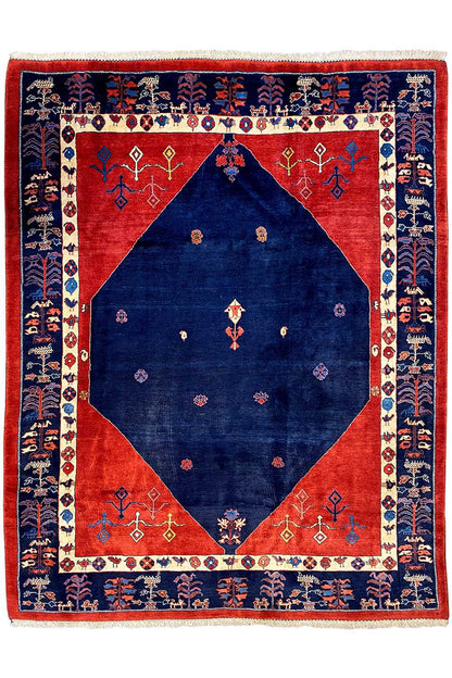 Square rug: blue center, red frame pattern, and decorative border