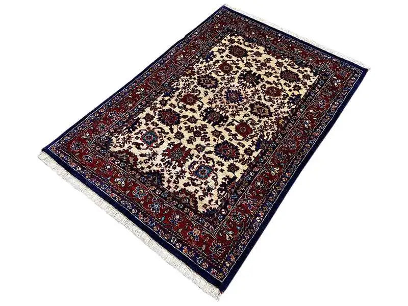 Rug with a square cut and floral ornamental pattern, beige background, dark blue